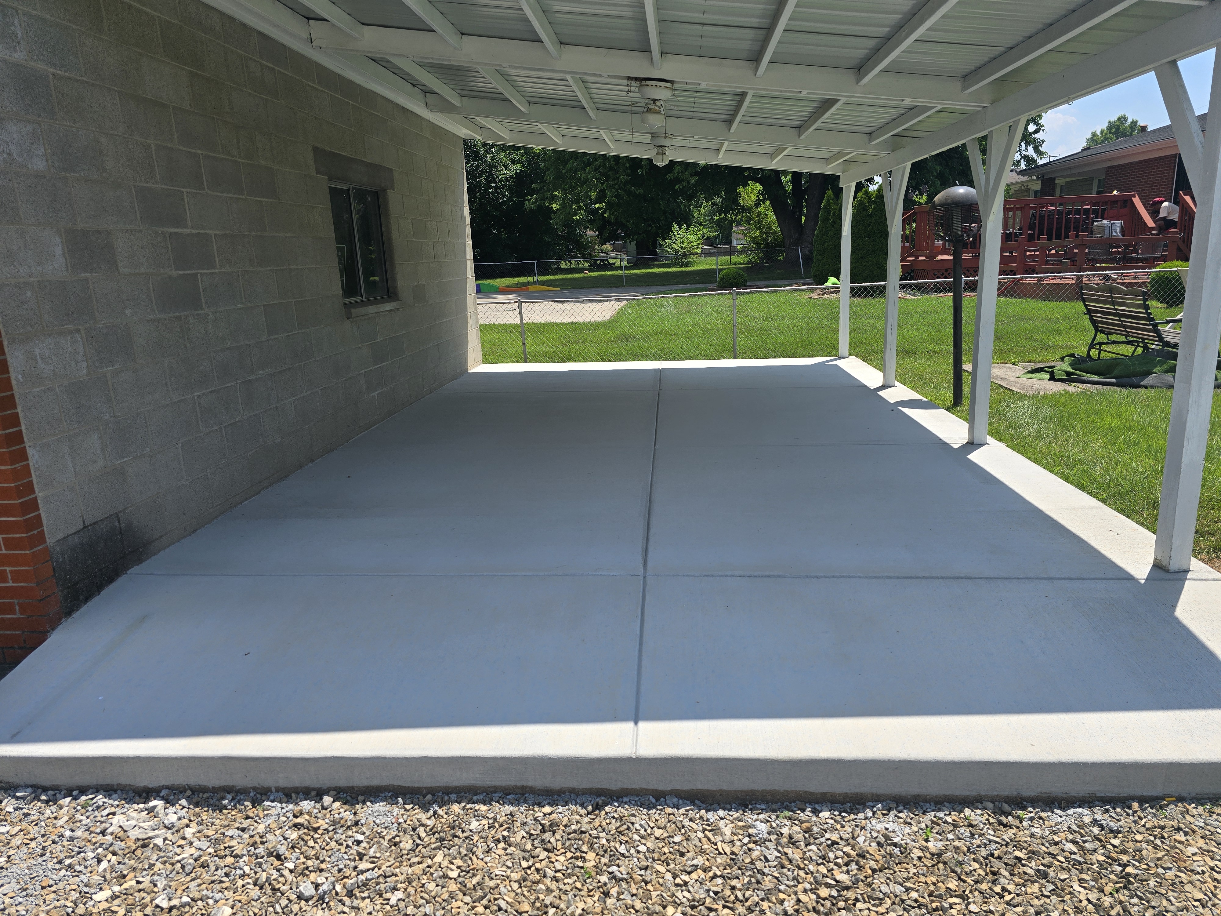 Covered carport concrete slab installation